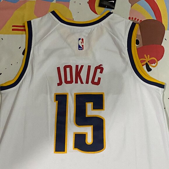 Denver Nuggets Player Jokić Wearing A White Jersey With The Number 15 - Picture 6 of 7